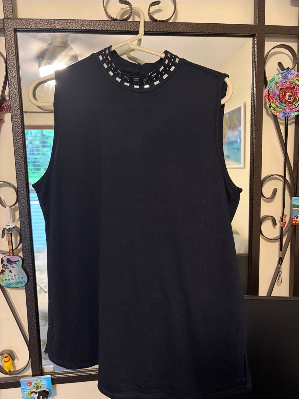 Sleeveless Navy Top with silver studs on Mock Neck